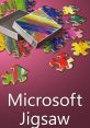 Colorful jigsaw puzzle pieces scattered around an open box, representing Microsoft Jigsaw gaming experience.