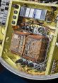 Close-up of missile guidance system components, showcasing intricate circuit boards and wiring connections for precision targeting.