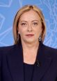 Giorgia Meloni, Italy's president, delivers a poised address with a professional demeanor, showcasing her leadership style.
