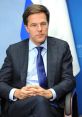 Mark Rutte in a formal setting, showcasing his leadership and focus as Prime Minister of the Netherlands.