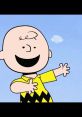 Charlie Brown, the beloved Peanuts character, smiling and wearing his iconic yellow shirt with black stripes.