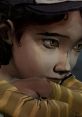 Clementine from The Walking Dead, portrayed by Melissa Hutchison, shows determination in her expressive eyes.