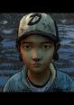 Clementine stares intently, embodying resilience and courage in a snowy landscape from The Walking Dead: Season 2.