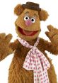 Fozzie Bear, the lovable Muppet comedian, smiles with a pink polka dot scarf and brown hat, ready for a laugh.