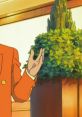Giovanni from Pokemon gesturing confidently, surrounded by lush greenery in a stylish environment.