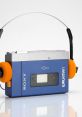 Walkman Library The of buttons being clicked on a Sony Walkman cassette player echo through the room, creating a sense of