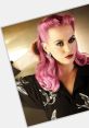 Stylish woman with vibrant pink hair and bold makeup, showcasing a retro glam look reminiscent of Gummibär's character.