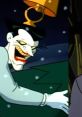 Joker from Batman: The Animated Series, featuring iconic grin and playful demeanor in a snowy setting.