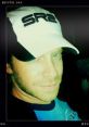 Seth Green wearing an SR2 hat, portraying Joker from Mass Effect 3, showcasing a playful and confident expression.