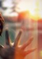 Max Caulfield reaching out, embodying her powers of time manipulation in a vibrant, dreamlike scene from Life Is Strange.