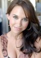 Lacey Chabert as Princess Elise, showcasing her captivating smile and elegant style in a striking patterned outfit.