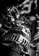Mechanical The whirring of gears and the clanking of metal reverberated through the workshop as the mechanical arm swung