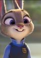 Judy Hopps from Zootopia smiling in her police uniform, showcasing her charming personality and determination.