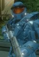 Michael J. Caboose in blue armor with a rifle, ready for action in the "Red Vs Blue" universe. Iconic character moment.