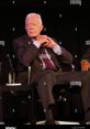 Jimmy Carter, the 39th U.S. President, reflecting thoughtfully during a public discussion event.