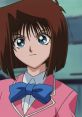 Tea Gardner in a pink outfit with a blue bow tie, showcasing her confident expression from the series.