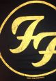 Vintage Foo Fighters logo on a black t-shirt, featuring a distressed yellow design, perfect for fans and collectors.
