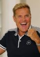 Dieter Bohlen celebrates success, showcasing excitement during testing e3 with a joyful smile and energetic gesture.