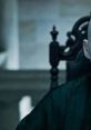 Lord Voldemort sitting in a dark, imposing chair, embodying dark magic and power in a suspenseful atmosphere.