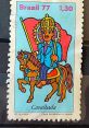 Colorful Brasil 77 stamp featuring a king on a horse, celebrating the Brazilian Cavalhada tradition. Collectible art piece.