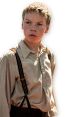 Eustace Scrubb character in "The Chronicles of Narnia," wearing a beige shirt and suspenders, looking determined.