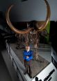 A researcher stands proudly beside a mammoth skeleton, showcasing ancient history and fossil discovery expertise.