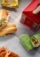 Delicious variety of sandwiches and wraps from Sparky's Sus, featuring fresh ingredients and vibrant colors. Perfect for lunch!