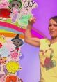 Dr. Polar Bear (Jen Pringle) showcasing colorful children's artwork with a cheerful expression and a flexed arm.