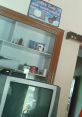 Vintage TV and decor in a cozy room, featuring a sign related to Daniel (itzultrascout) and singing.