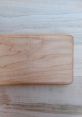 Natural wood bread sound board with a smooth finish, perfect for baking enthusiasts and artisan bread making.