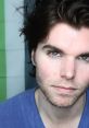 Onision, known for his YouTube presence, features a close-up portrait with intense gaze and messy hair.