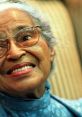 Rosa Parks smiles warmly, showcasing her legacy in civil rights and courage against racial segregation.