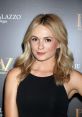 Madison Gort wearing a black dress at a glamorous event, showcasing her stylish look and radiant beauty.