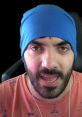 Spanish YouTuber ITownGamePlay wearing a blue beanie, engaging viewers with dynamic expressions and energetic content.