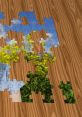 Colorful jigsaw puzzle pieces on a wooden surface, featuring vibrant skies and blooming flowers, showcasing creativity and detail.