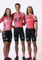 Cycling team members in pink and black jerseys representing E F pose together, showcasing team spirit and athleticism.