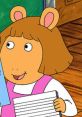 Character from Arthur holding a notebook, showing enthusiasm in a classroom setting with a playful expression.