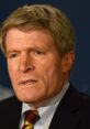 Richard Painter speaking at a press conference, emphasizing legal and ethical standards in politics.