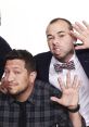 Sal and Joe from TruTV's Impractical Jokers pose playfully, showcasing their signature comedic styles and expressions.