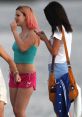 Young women in colorful outfits enjoying a beach day, capturing the essence of carefree spring break fun.