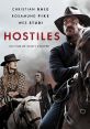 Christian Bale, Rosamund Pike, and Wes Studi in "Hostiles," a gripping Western film directed by Scott Cooper.