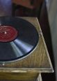 Vintage Victrola record player showcasing a classic vinyl record, evoking nostalgia and the history of music.