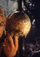 A character holding a skull, symbolizing mortality in Shakespeare's Hamlet, reflecting the play's themes of death and contemplation.